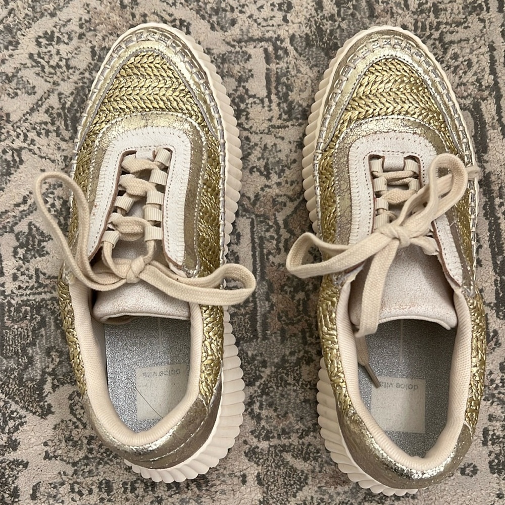 Gold cream tennis shoes
